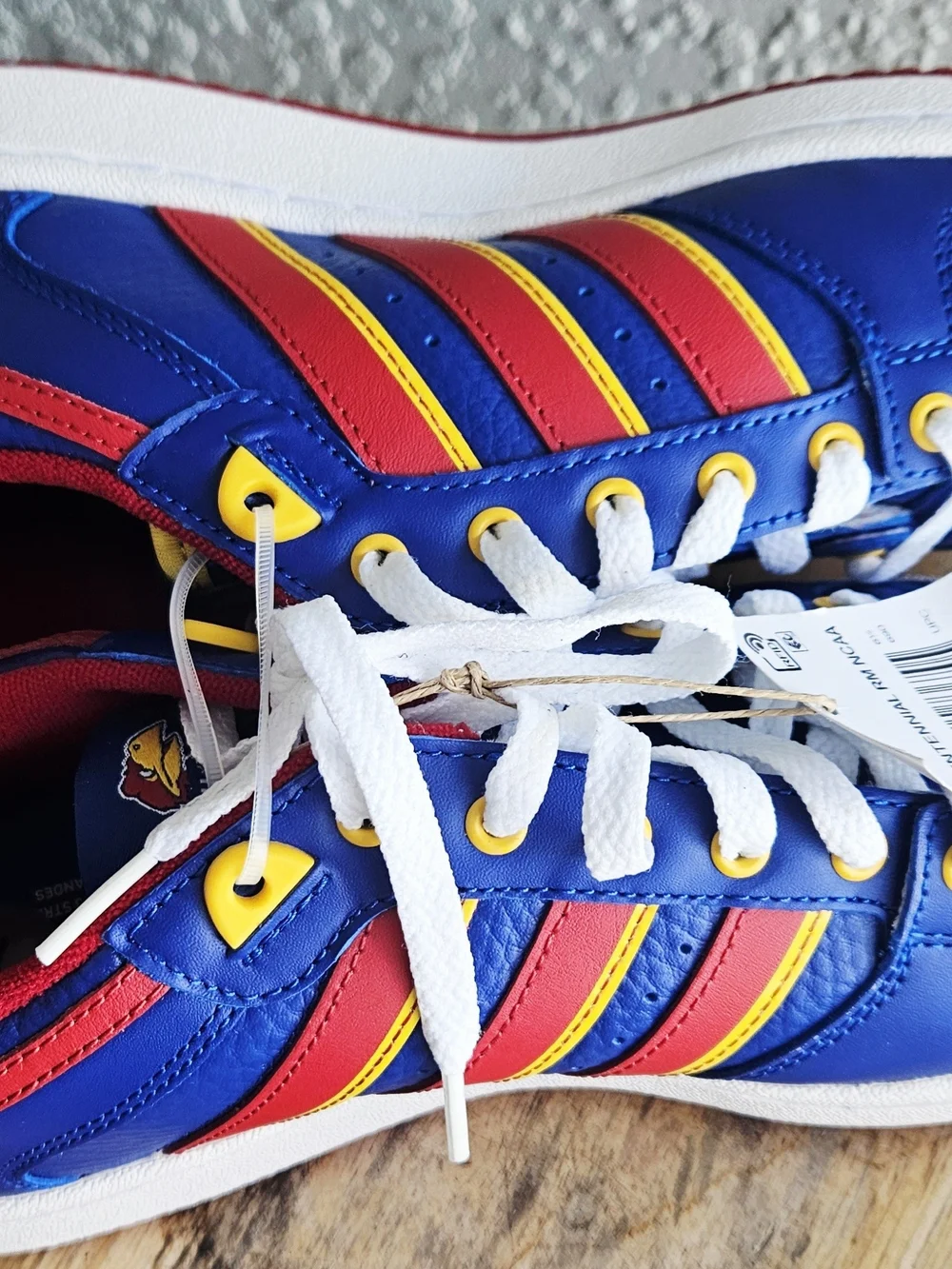 adidas Blue Sneakers with Red & Yellow Accents